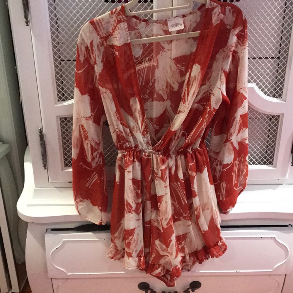 Orange and white patterned romper